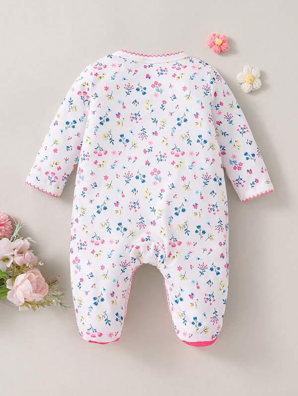 Mameluco de flores para bebé niña