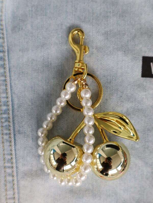 Charm llavero cerezas doradas