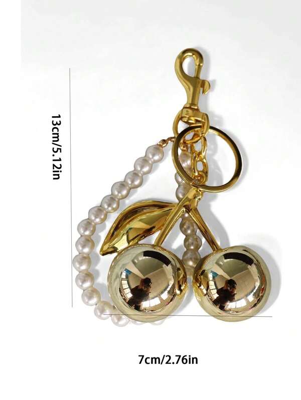 Charm llavero cerezas doradas